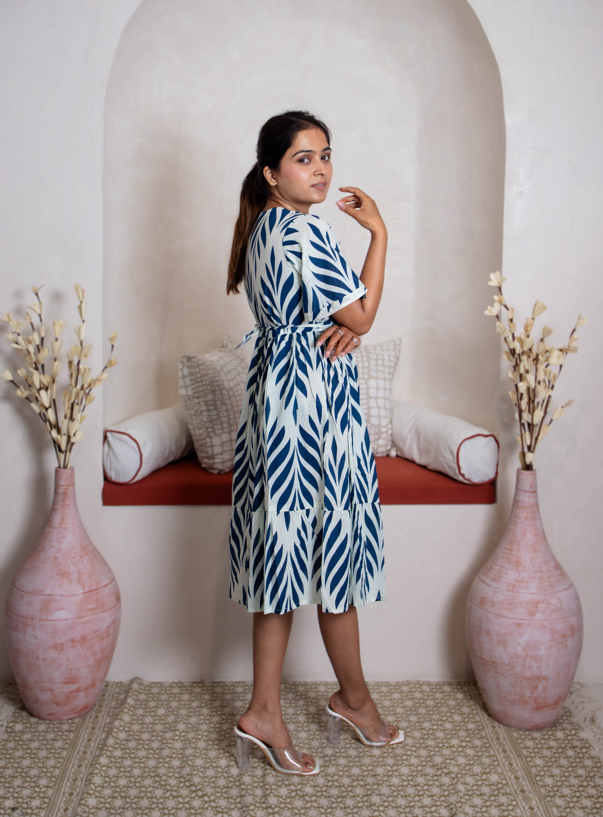 girl in blue branches dress right view