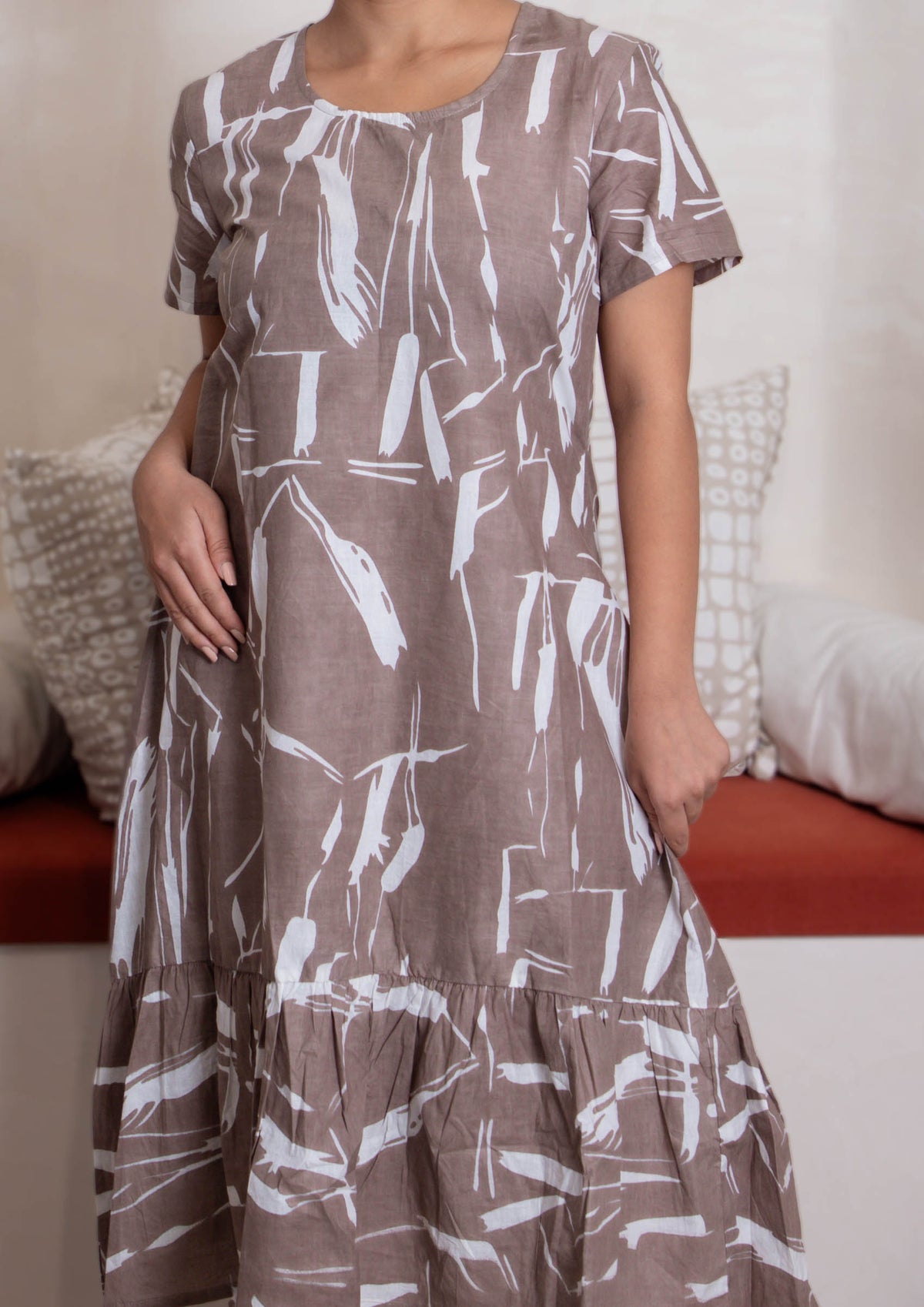 closeup view of brown white dress