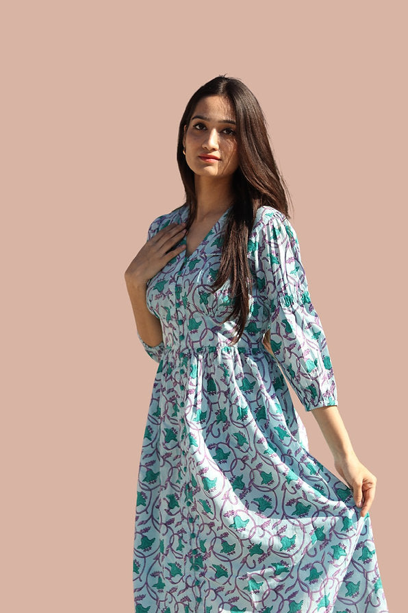 girl in floral blue dress side view