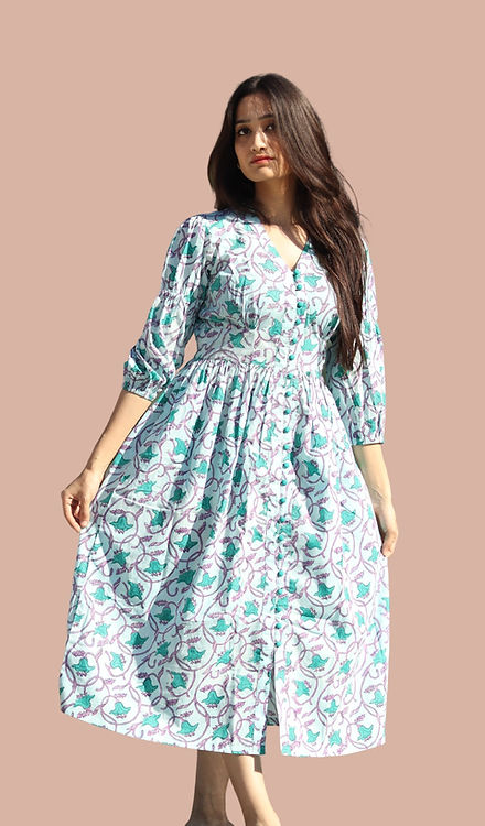girl in floral blue dress full view
