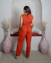 girl in orange coord back view