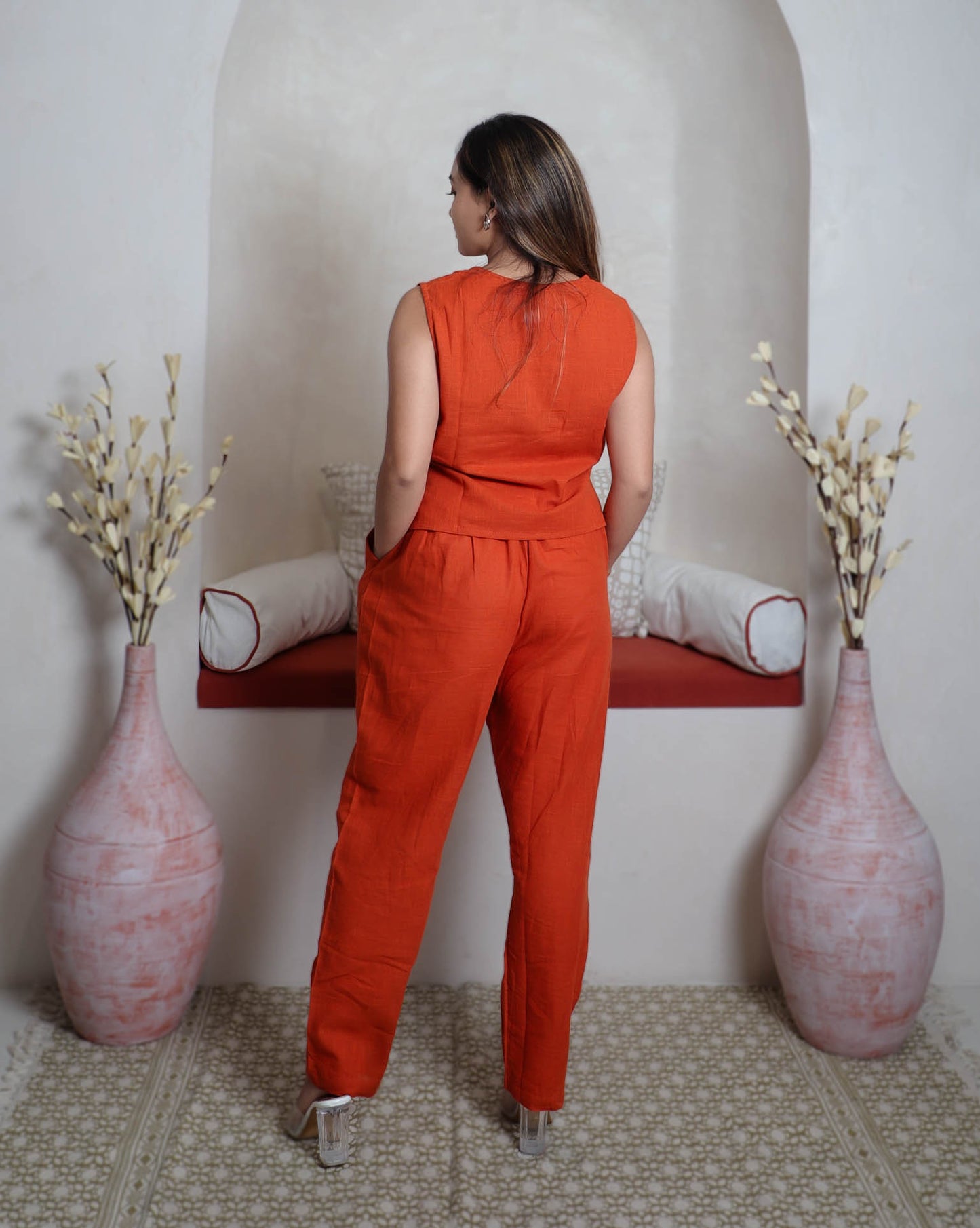 girl in orange coord back view