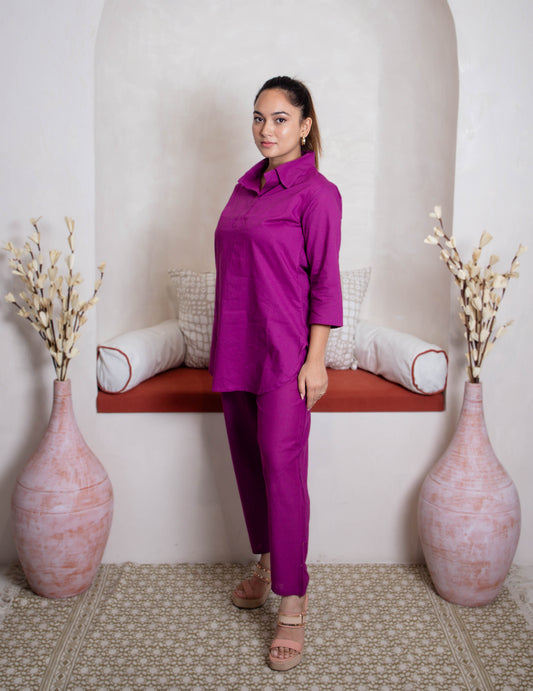 girl in plum coordset side view