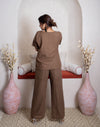 girl in earthy coordset back view