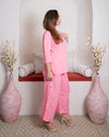right side view of pink coord set