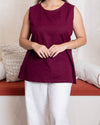 girl in maroon top closeup