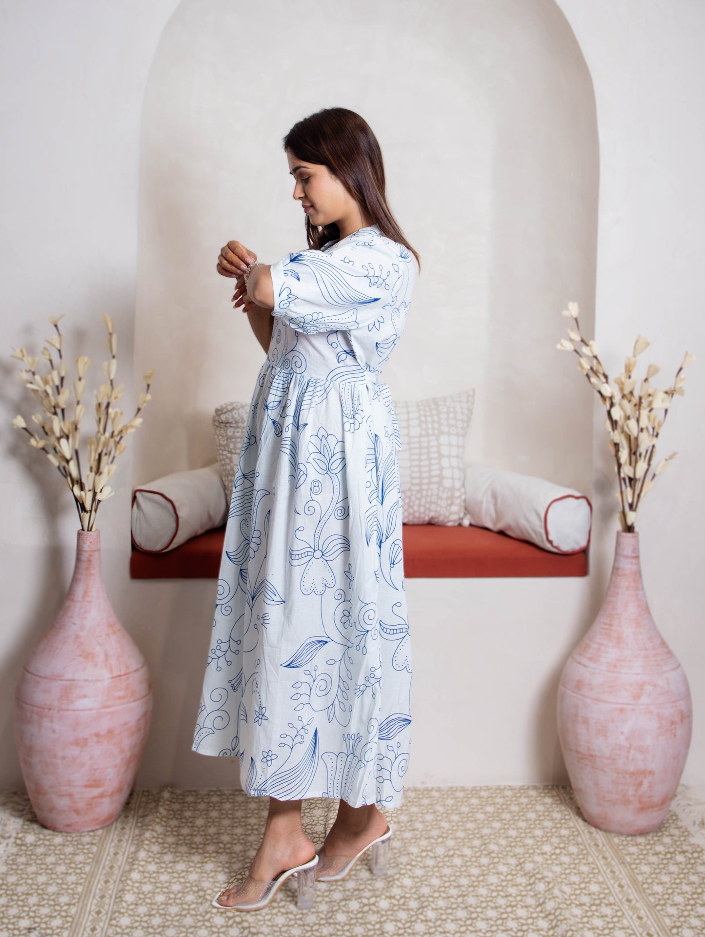 left view of white blue floral dress