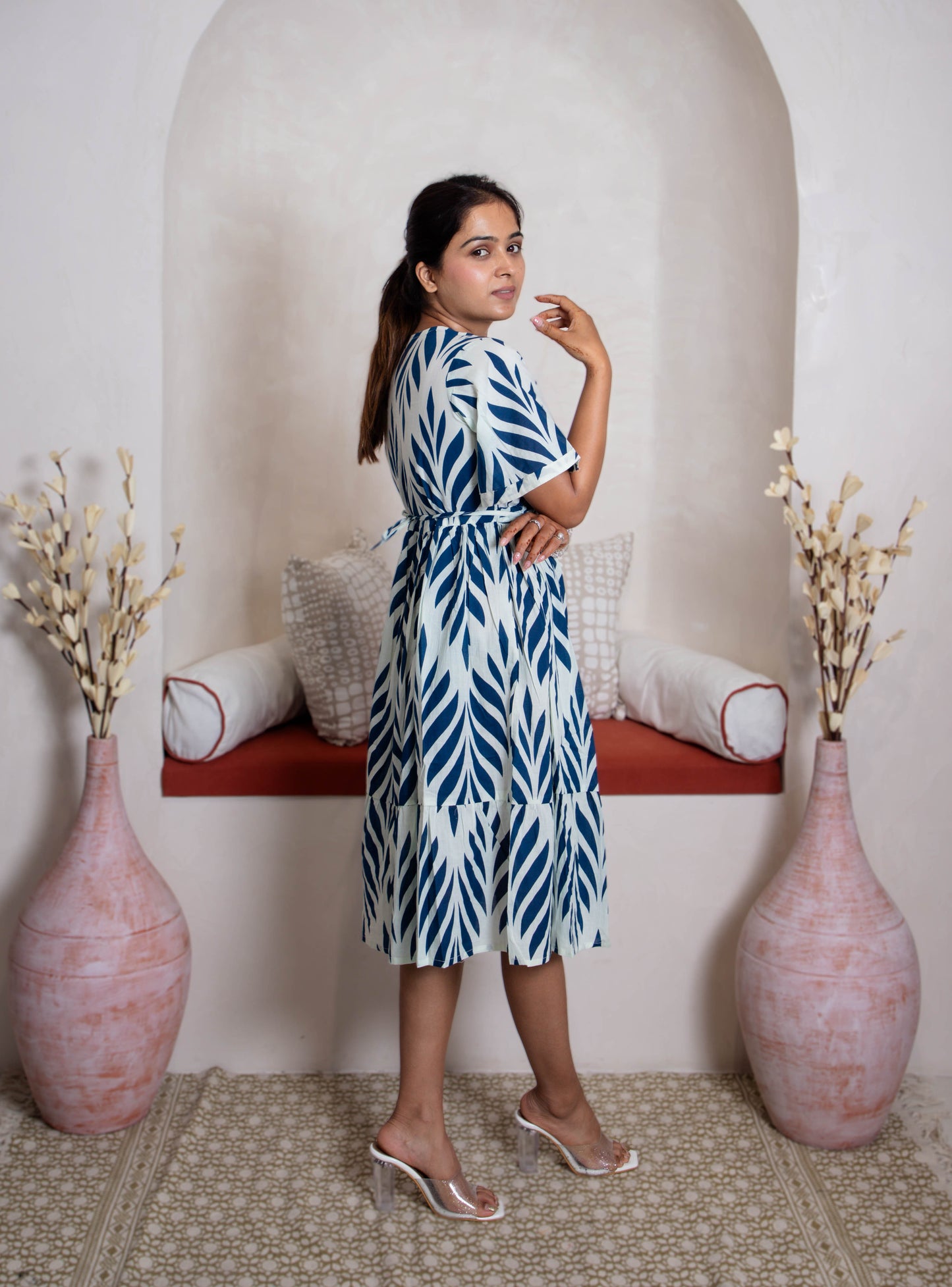 girl in blue branches dress right view