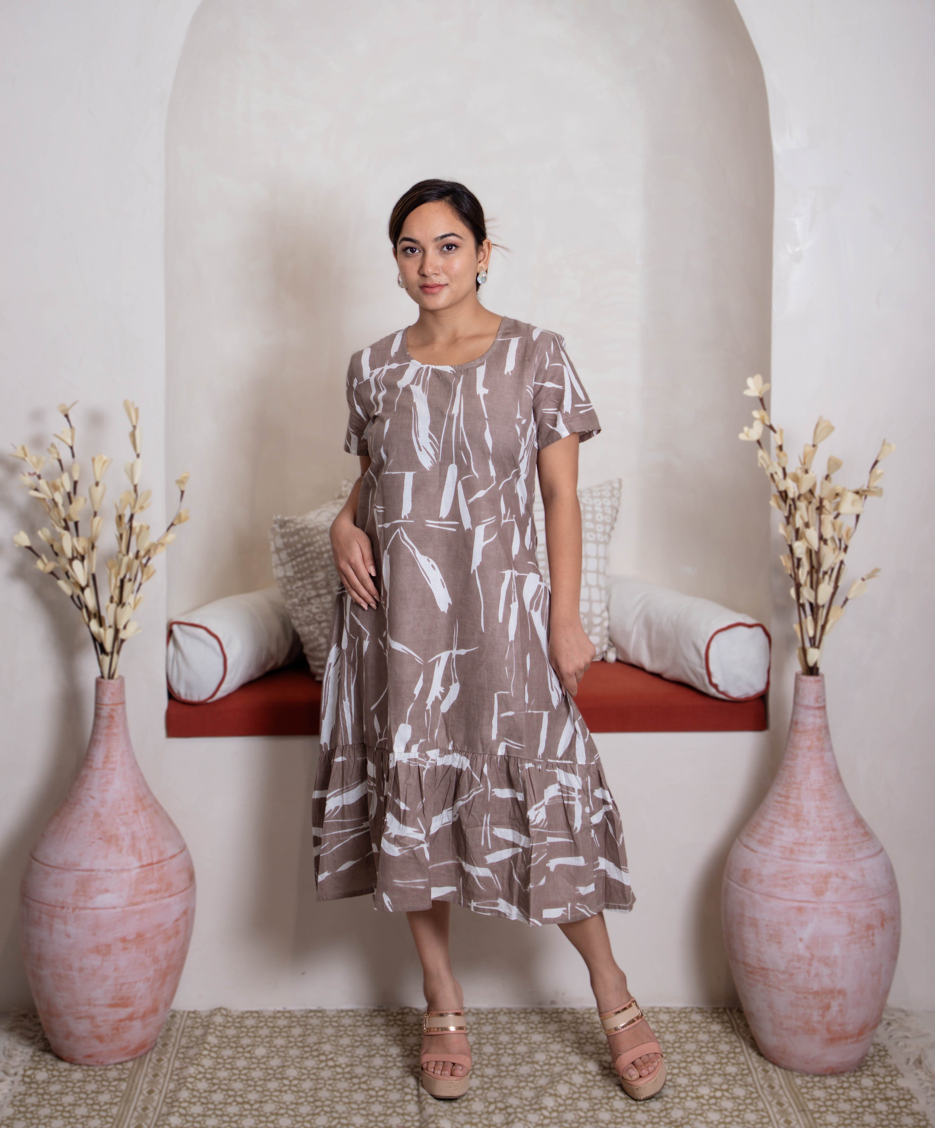 girl in brown white dress midi