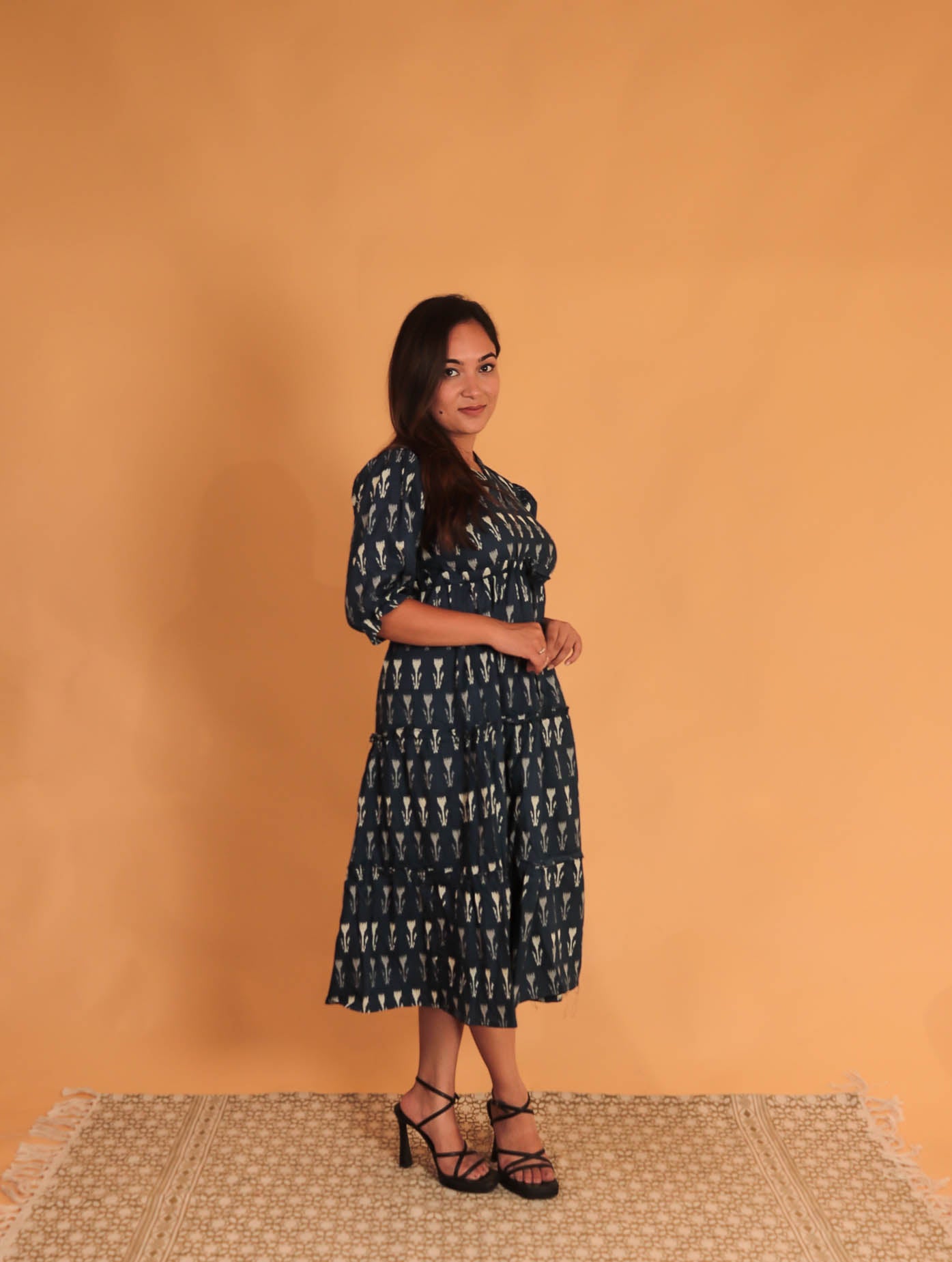 girl in navy blue floral dress